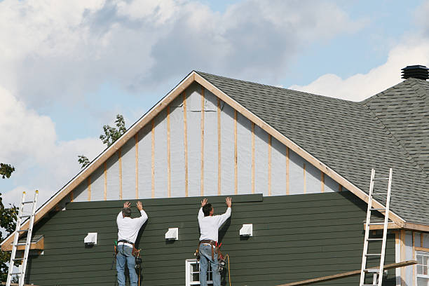 Professional Siding technician working in Laurel, MD